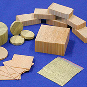 a bunch of wooden blocks on a blue surface