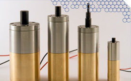 a group of metal cylinders with wires attached to them